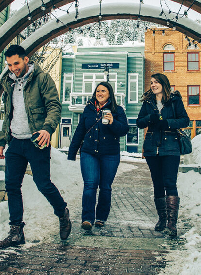 Employees of GCommerce Hotel Marketing Company walking on Mainstreet Park City Utah