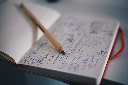 notebook with pencil
