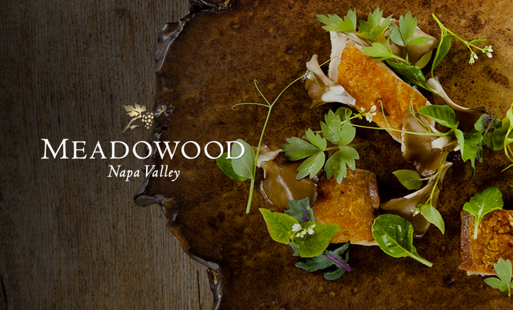 http://Meadowood%20Napa%20Valley%20over%20a%20wooden%20table%20with%20leaves