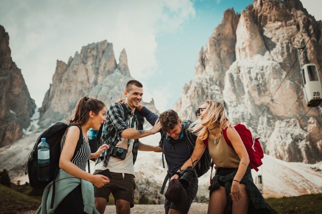 Four young adults in the mountains