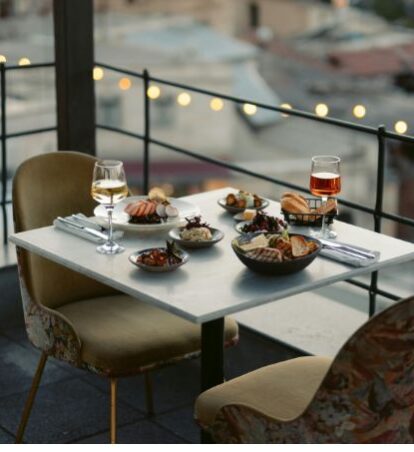 Photo of two chairs and food